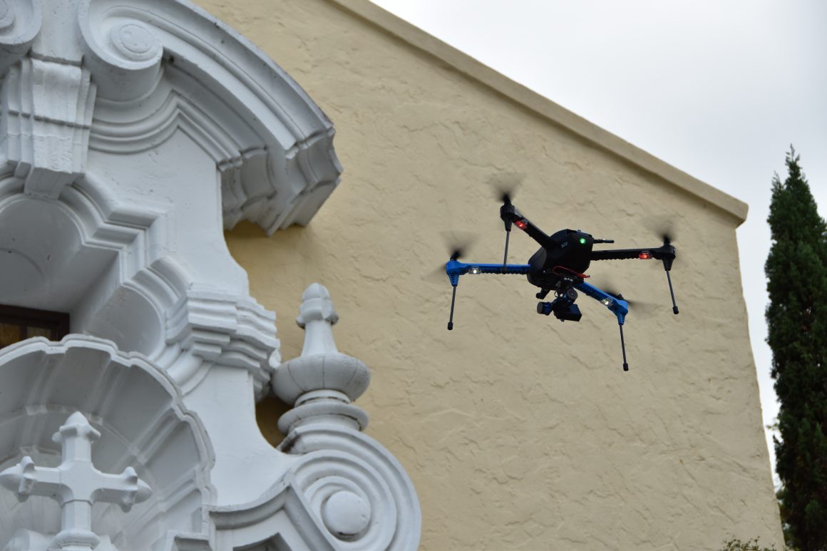 The use of drones (like the one pictured here) to take thousands of photographs of architectural structures provides a quick and inexpensive means of capturing photographic data to make point clouds.