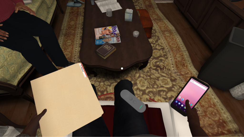 The image shows the perspective of the user, sitting in a chair and looking down at their hands. The user has a file in one hand and their smartphone in the other. The virtual client is sitting on the sofa, a coffee table, and rug are seen in the background.