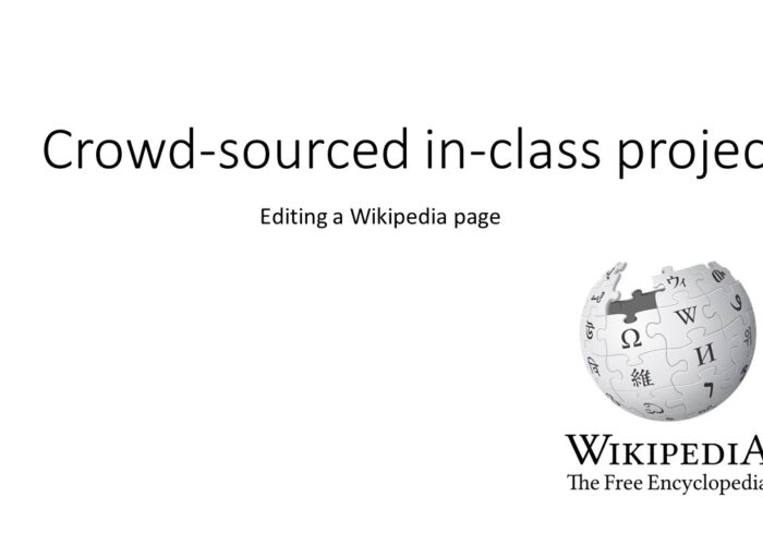 Powerpoint slide reading "Crowd-sourced in-class project", featuring the Wikipedia globe logo.